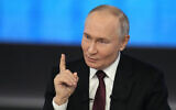 Russian President Vladimir Putin gestures while speaking during his annual news conference and call-in show at Gostinny Dvor in Moscow, Russia, December 19, 2024. (AP/Alexander Zemlianichenko)