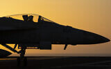 A US fighter jet maneuvers on the deck of the USS Dwight D. Eisenhower in the Red Sea, June 11, 2024. (AP Photo/Bernat Armangue, File)