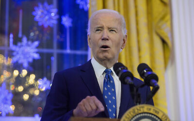 US President Joe Biden speaks during a Hanukkah reception in the East Room of the White House in Washington, December 16, 2024. (Rod Lamkey, Jr./AP)
