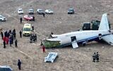 The wreckage of Azerbaijan Airlines Embraer 190 on the ground near the airport of Aktau, Kazakhstan, December 25, 2024. (AP Photo/Azamat Sarsenbayev)