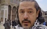 Screen capture from video of Abdul Rahman al-Qaradawi, son of late spiritual leader of the Muslim Brotherhood, as he walks in the Umayyad mosque, Damascus, Syria, December 2024. (X. Used in accordance with Clause 27a of the Copyright Law)