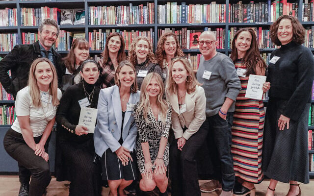 Zibby Books publisher Zibby Owen, third from left, front row, with some of the contributors to 'On Being Jewish Now,' an anthology that came out in October 2024, at Zibby's Book Shop, Santa Monica, California (Courtesy Innis Casey Photography)