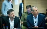 Finance Minister Bezalel Smotrich (left) and Finance Ministry Director General Shlomi Heisler attend a  committee meeting at the Knesset on February 12, 2024 (Yonatan Sindel/Flash90)
