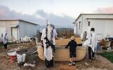 Jews attend a special prayer at the newly recognized Evyatar outpost, in the West Bank, July 7, 2024. (Chaim Goldberg/Flash90)