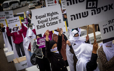 Members of the Arab community protest against the violence in their community, outside the Knesset on November 27, 2024. (Yonatan Sindel/Flash90)