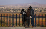 People watching the Quneitra Border Crossing and the surroundings on the Israeli border with Syria, in the Golan Heights, on December 8, 2024. (David Cohen/Flash90)