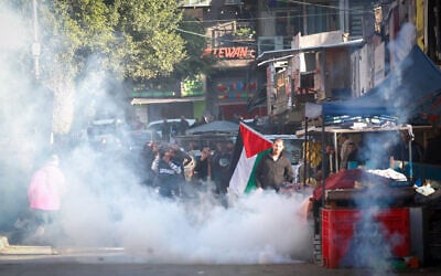 Palestinian security forces patrol in the center of the city of Jenin in the West Bank, December 16, 2024. (Nasser Ishtayeh/Flash90)