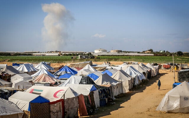 Smoke after an explosion, as seen from a tent encampment in a humanitarian zone, southern Gaza Strip. December 17, 2024 (Abed Rahim Khatib/FLASH90)