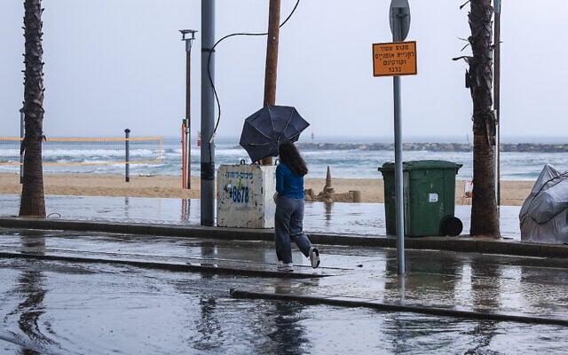 A beach in Tel Aviv after a heavy rainstorm, December 20, 2024. (Itai Ron/Flash90)