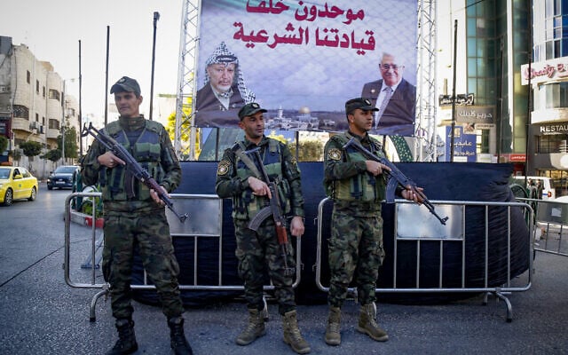 Members of the Palestinian security forces stand guard in the West Bank city of Hebron, December 24, 2024. (Wisam Hashlamoun/Flash90) Members of the Palestinian security forces stand guard in the West Bank city of Hebron, December 24, 2024. (Wisam Hashlamoun/Flash90)