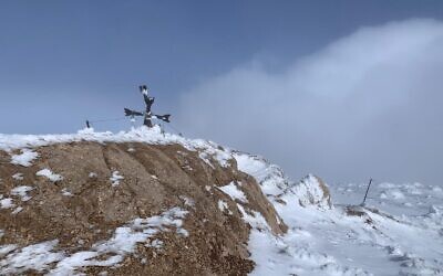 A Christian cross that was apparently damaged by IDF troops on Syria’s Mount Hermon and then returned to its original position on December 24, 2024. (Israel Defense Forces)