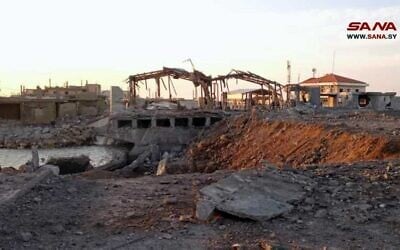A photo published by Syrian state media shows damage to the Arida Crossing between northern Lebanon and Syria after overnight Israeli airstrikes, December 6, 2024. (SANA)