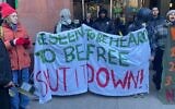 Students hold an anti-Israel protest outside New York University on December 12, 2024. (Luke Tress/Times of Israel)
