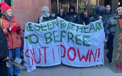 Students hold an anti-Israel protest outside New York University on December 12, 2024. (Luke Tress/Times of Israel)