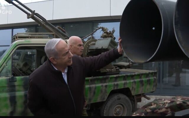 Prime Minister Benjamin Netanyahu views weapons the IDF confiscated from Hezbollah during the ground operation in southern Lebanon at the IDF Northern Command headquarters in Safed, December 22, 2024. (Screenshot/GPO, used in accordance with Clause 27a of the Copyright Law)