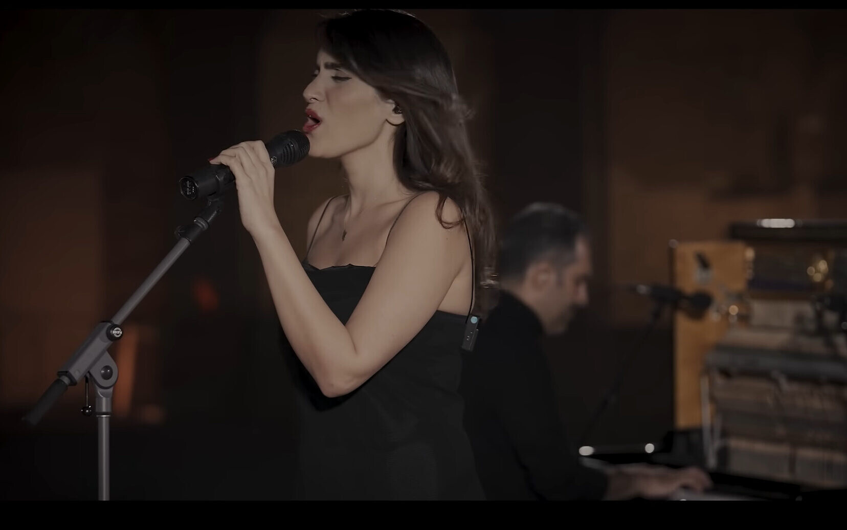 NextImg:Iran arrests female singer who performed on YouTube without hijab