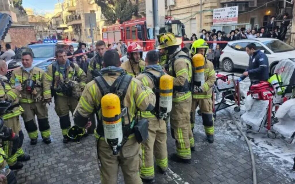 Firefighters at the scene of a fire at a Jerusalem boarding school, December 23, 2024 (Fire and Rescue Service)