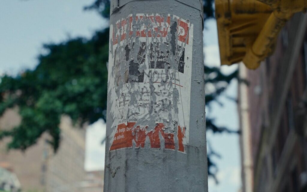 A scratched out and defaced KIDNAPPED poster depicting an 84-year-old Israeli taken hostage to Gaza on October 7 as seen in Nim Shapira's film 'TORN: The Israel-Palestine Poster War on NYC Streets.' (Eyal Bau Cohen)