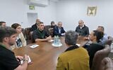 Udi Goren, second from left, with Prime Minister Benjamin Netanyahu as he meets with relatives of Israelis held hostage in Gaza, December 8, 2024. (Kobi Gideon/GPO)