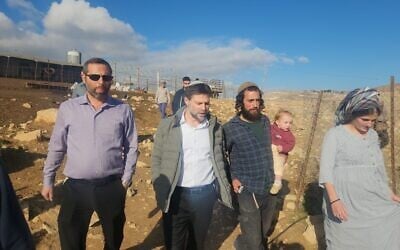 Finance Minister Bezalel Smotrich visits the illegal farming outpost of Mishkenot Harel in the central West Bank on December 29, 2024 (Office of Finance Minister Bezalel Smotrich)