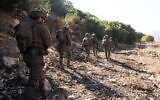 Troops of the IDF's 91st Division operate in southern Lebanon, in a handout photo issued on December 15, 2024. (Israel Defense Forces)