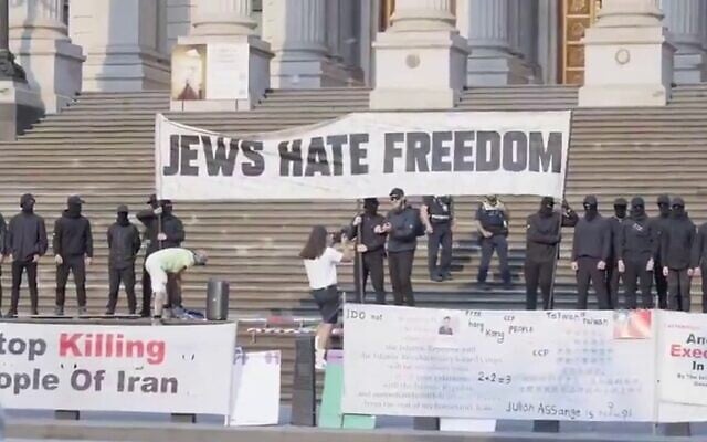 A group of neo-Nazis protest against a proposed law clamping down on demonstrations outside houses of worship, on the steps of Victoria's Parliament House in Melbourne, Australia, on December 20, 2024. (X, Screenshot, used in accordance with Clause 27a of the Copyright Law)