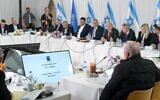 Prime Minister Benjamin Netanyahu, fourth from right, addresses ministers at a special cabinet meeting in Nahariya, December 3, 2024. (Maayan Toaf/GPO)