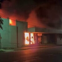 Footage posted to social media shows a fire blazing in the Adass Israel Synagogue in the Melbourne suburb of Ripponlea, Australia, December 6, 2024. (Screenshot, used in accordance with Clause 27a of the Copyright Law)