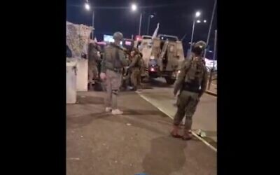 IDF troops at the scene of a car-ramming attack near the West Bank's Fawwar camp, close to Hebron, December 7, 2024. (Rescuers Without Borders)