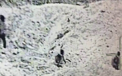 Screen grab of a video released by the military apparently shows terror operatives fleeing during an ambush in Jabalia on December 30, 2024 (Israel Defense Forces)