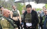 For illustration: Former NBA player and investor Omri Casspi (second from right) tours Israel's devastated south with tech billionaire Elon Musk (right) in November 2023. (Courtesy)
