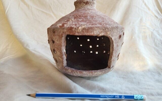 Byzantine-era clay lantern discovered at Tzippori National Park, in an image released on Decem,ber 22, 2024. (Daniel Hittner/National Parks Authority)