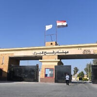 The flag of Egypt sways in the wind on the Egyptian side of the Rafah Border Crossing with the Gaza Strip on September 9, 2024. (AFP)