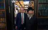 This handout photo taken and released by the Department of Prime Minister and Cabinet on December 10, 2024, shows Australia's Prime Minister Anthony Albanese (L) visiting the torched Adass Israel Synagogue with Rabbi Shlomo Kohn in Melbourne on December 10, 2024. (Handout / DEPARTMENT OF PRIME MINISTER AND CABINET / AFP)