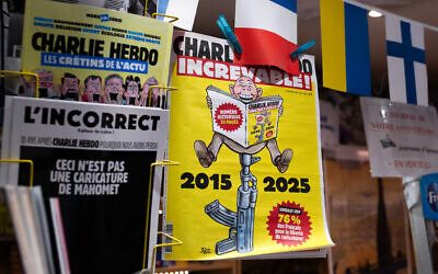 A special edition of French satirical newspaper Charlie Hebdo, published ahead of the 10th anniversary of a deadly terrorist attack on its staff, displayed at a kiosk in Paris, on January 6, 2025. (Martin Lelievre / AFP)