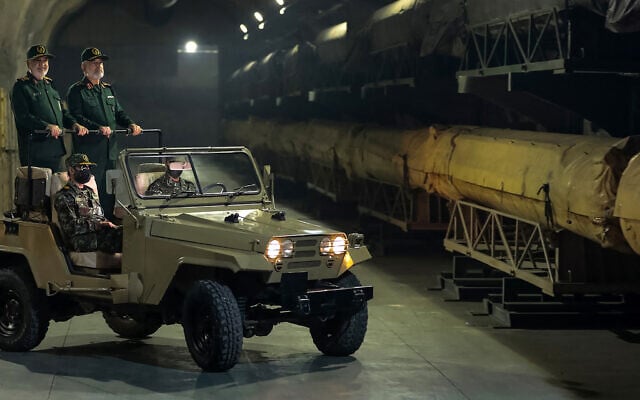 A handout picture made available by the Iranian IRGC office on January 11, 2025, shows Hossein Salami (L), head of Iran's Revolutionary Guards and Amir Ali Hajizadeh, head of the Guard's airforce, touring an underground missile base in an undisclosed location in Iran. Iranian state TV on January 10 showed the commander of the Islamic Revolutionary Guard Corps touring an underground missile base used in an attack against Israel, hours after fighters marched through Tehran. (IRGC website/AFP) A handout picture made available by the Iranian IRGC office on January 11, 2025, shows Hossein Salami (L), head of Iran's Revolutionary Guards and Amir Ali Hajizadeh, head of the Guard's airforce, touring an underground missile base in an undisclosed location in Iran. Iranian state TV on January 10 showed the commander of the Islamic Revolutionary Guard Corps touring an underground missile base used in an attack against Israel, hours after fighters marched through Tehran. (IRGC website/AFP)