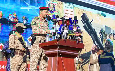 Brigadier Yahya Saree Qasim, the spokesman for Yemen's Houthis, speaks during a rally denouncing Israel and in solidarity with Palestinians in the Houthi-controlled capital Sanaa on January 17, 2025. (Mohammed HUWAIS / AFP)