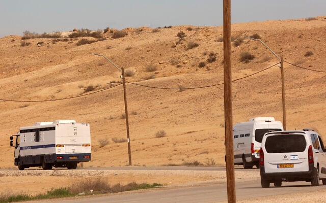 Buses transporting Palestinian prisoners drive away from the Ketziot Prison in the Negev on January 25, 2025 (GIL COHEN-MAGEN / AFP)