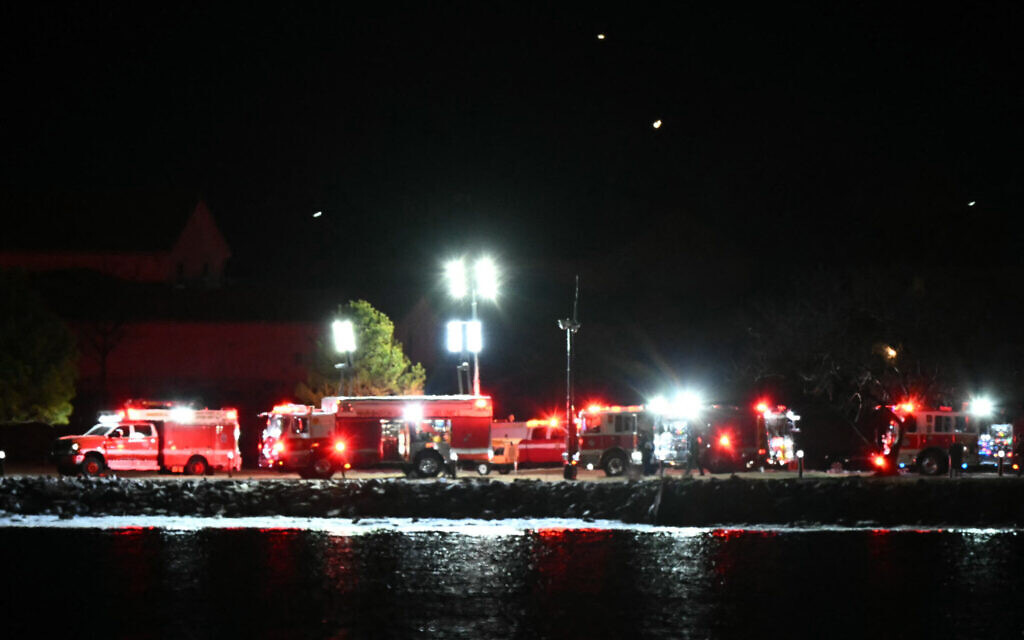 Plane with 64 aboard crashes into Washington DC river after army helicopter collision