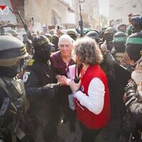 This handout image released by the Hamas Media Office on January 30, 2025, shows hostage Gadi Mozes during his handover to a Red Cross team in Khan Younis, Gaza Strip. (Hamas Media Office/AFP)