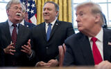 In this February 7, 2019 file photo, from left, National Security Adviser John Bolton, accompanied by Secretary of State Mike Pompeo, and US President Donald Trump, speaks before Trump signs a National Security Presidential Memorandum to launch the "Women's Global Development and Prosperity" Initiative in the Oval Office of the White House in Washington. (AP Photo/Andrew Harnik)