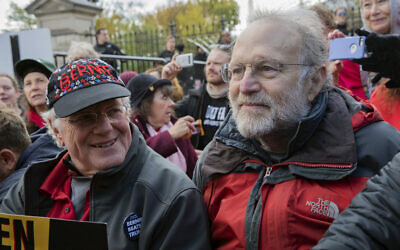 Jerry Greenfield (right) and Ben Cohen (left), co-founders of Ben & Jerry's ice cream, attend a protest in Washington on November 8, 2019. (AP Photo/Patrick Semansky, File)