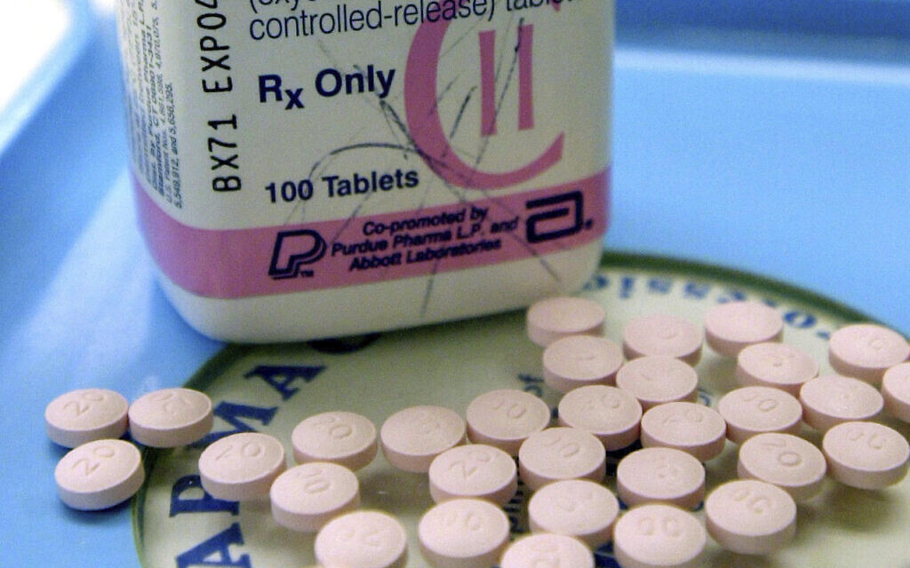 Purdue Pharma and owners to pay $7.4bn in settlement over the toll of OxyContin