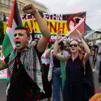 Protesters shout slogans during a rally against Israel's operations in Gaza and Lebanon, in Athens, Greece, on Saturday, Oct. 5, 2024. (AP/Yorgos Karahalis)