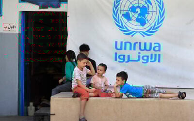 Palestinian children who fled with their parents from their houses in the Palestinian refugee camp of Ein el-Hilweh, gather in the backyard of an UNRWA school, in Sidon, Lebanon, September 12, 2023. (AP Photo/Mohammed Zaatari)