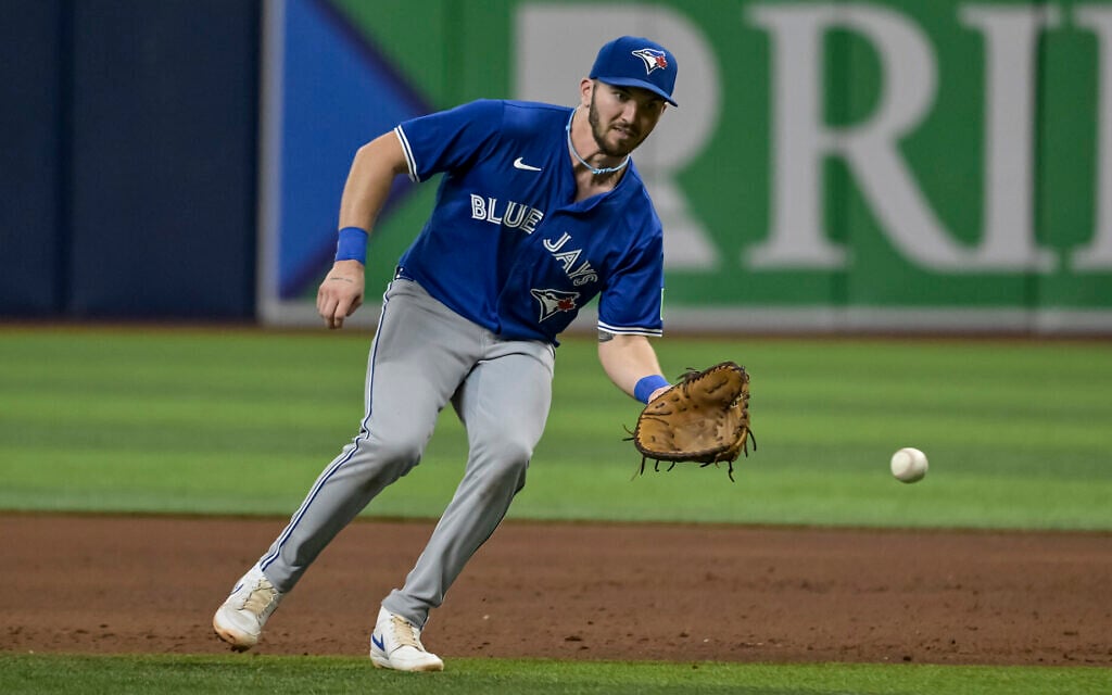 Toronto Blue Jays first baseman Spencer Horwitz reaches for an infield grounder during a baseball game against the Tampa Bay Rays September 21, 2024, in St. Petersburg, Fla. (AP Photo/Steve Nesius, File) Toronto Blue Jays first baseman Spencer Horwitz reaches for an infield grounder during a baseball game against the Tampa Bay Rays September 21, 2024, in St. Petersburg, Fla. (AP Photo/Steve Nesius, File)