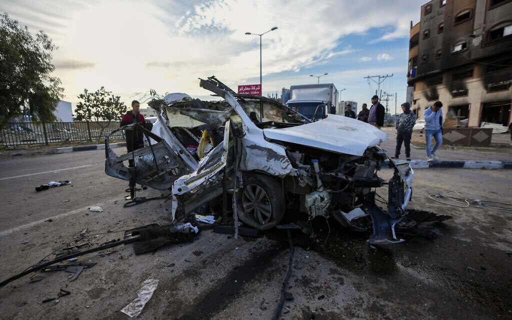 Palestinians inspect a car targeted in an overnight Israeli airstrike in Khan Younis, southern Gaza Strip, Jan. 4, 2025. (AP Photo/Abdel Kareem Hana) Palestinians inspect a car targeted in an overnight Israeli airstrike in Khan Younis, southern Gaza Strip, Jan. 4, 2025. (AP Photo/Abdel Kareem Hana)