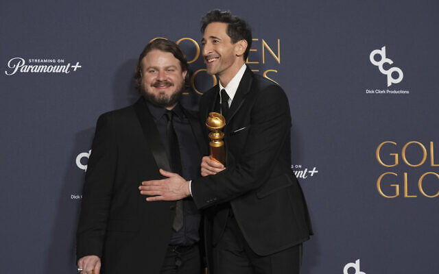 Brady Corbet, winner of the award for best director - motion picture for 'The Brutalist,' left, Adrien Brody, winner of the award for best performance by a male actor in a motion picture - drama for 'The Brutalist,' pose in the press room during the 82nd Golden Globes on January 5, 2025, at the Beverly Hilton in Beverly Hills, California. (AP Photo/Chris Pizzello) Brady Corbet, winner of the award for best director - motion picture for 'The Brutalist,' left, Adrien Brody, winner of the award for best performance by a male actor in a motion picture - drama for 'The Brutalist,' pose in the press room during the 82nd Golden Globes on January 5, 2025, at the Beverly Hilton in Beverly Hills, California. (AP Photo/Chris Pizzello)