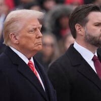 President-elect Donald Trump, left, and Vice President-elect JD Vance participate in a wreath laying ceremony at the Tomb of the Unknown Solider at Arlington National Cemetery, Sunday, January 19, 2025, in Arlington, Va. (AP/Evan Vucci)