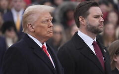President-elect Donald Trump, left, and Vice President-elect JD Vance participate in a wreath laying ceremony at the Tomb of the Unknown Solider at Arlington National Cemetery, Sunday, January 19, 2025, in Arlington, Va. (AP/Evan Vucci)